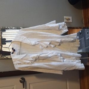 A white blouse criss cross in the bag size 18